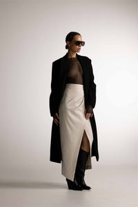 PIXIE WON'T PLAY VENERE WRAP SKIRT ECRU WHITE VERSATILE WRAP AROUND DESIGN FLATTERING SILHOUETTE EFFORTLESS STYLE TRENDY COMFORTABLE CHIC FEMININE ADJUSTABLE FIT DAY TO NIGHT WEAR CASUAL ELEGANCE SPRING SUMMER FALL WINTER CAPSULE COLLECTION ESSENTIAL LUXURY HIGH WAISTED DOUBLE WRAP